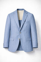 Blue pinstripe suit jacket on a white background